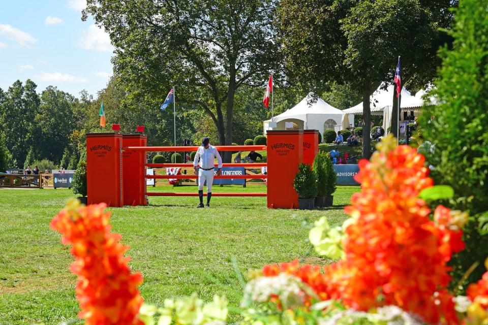 Riders walked the course before competing in the Grand Prix Ring.