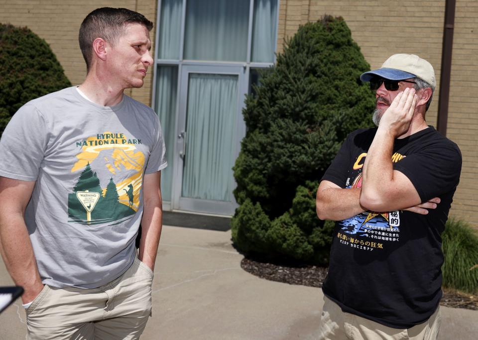 Tim Rich, left, and Travis Clark talk about Craig Robertson at the Provo Central Stake center in Provo on Wednesday, Aug. 9, 2023. FBI agents shot and killed Craig Robertson while serving search and arrest warrants at the residence. Robertson posted threatening comments about President Joe Biden hours before the president was scheduled to visit Utah. | Laura Seitz, Deseret News