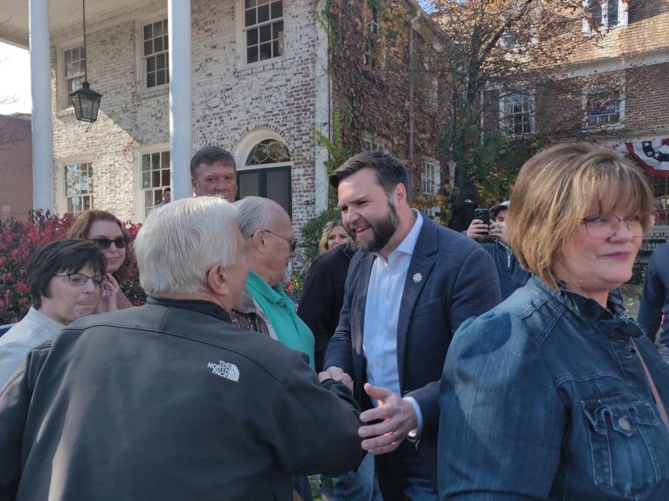 Ohio Senate hopeful JD Vance mingles with local Republicans during Ohio GOP's bus tour stop in Zanesville, Ohio.