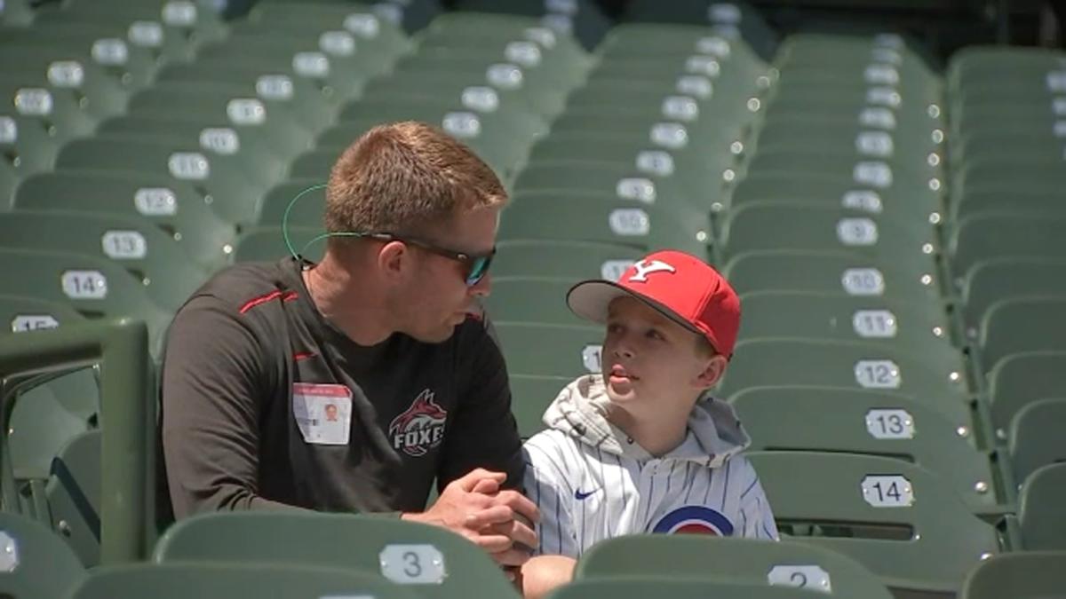 Bat girl, cancer survivor the 'ultimate Cubs fan