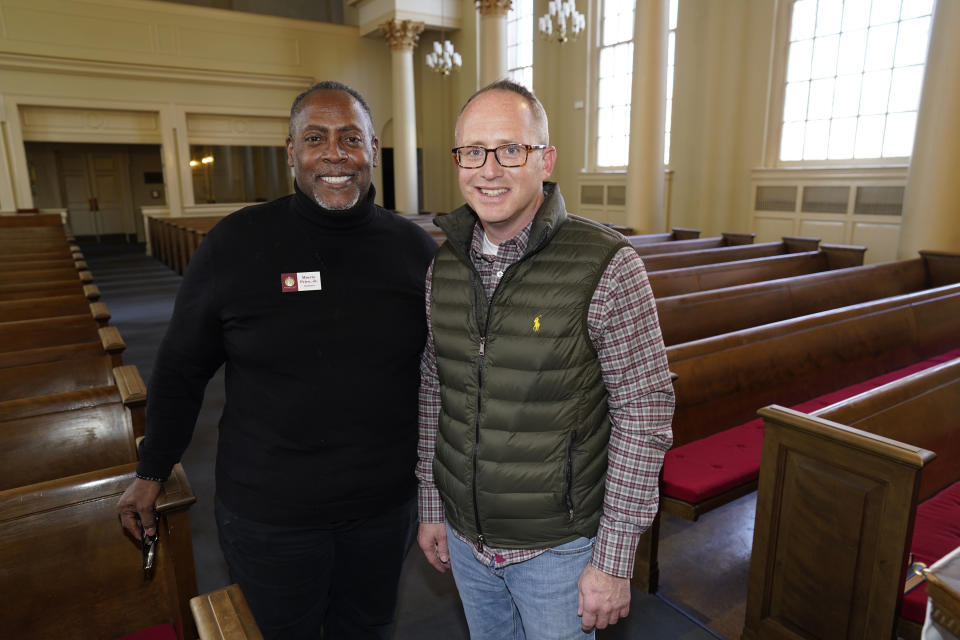 Morris Price Jr., left, moderator at First Baptist Church of Denver, is shown with Minister Brian Henderson in the church across from the State Capitol, Tuesday, Jan. 19, 2021, in downtown Denver. Businesses around the statehouse are struggling because of the effects of the coronavirus pandemic and now with the threat of violence around the Capitol on the inauguration day for President-elect Joe Biden. (AP Photo/David Zalubowski)