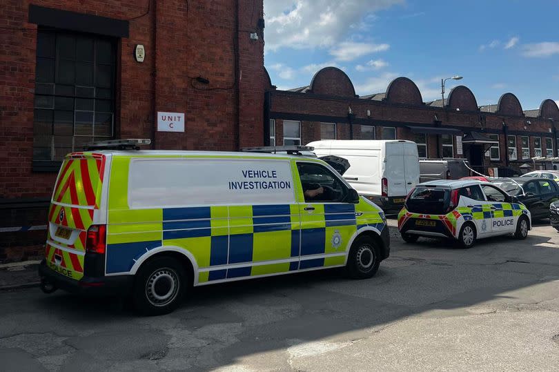 Police vehicles and a cordon picture on Bar Lane, Basford, on Tuesday afternoon (June 25)