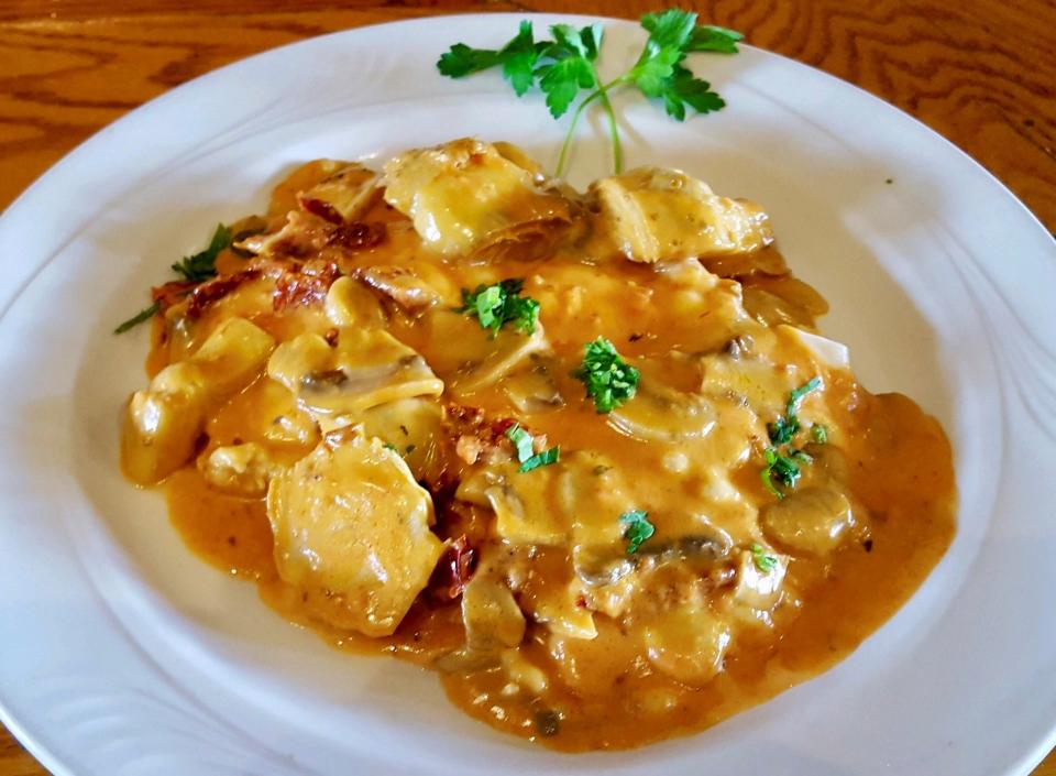 Pollo Rosina with chicken, mushrooms, artichokes and sun-dried tomatoes in a pink cream sauce and topped with mozzarella at Mama Rosina's in Bound Brook.