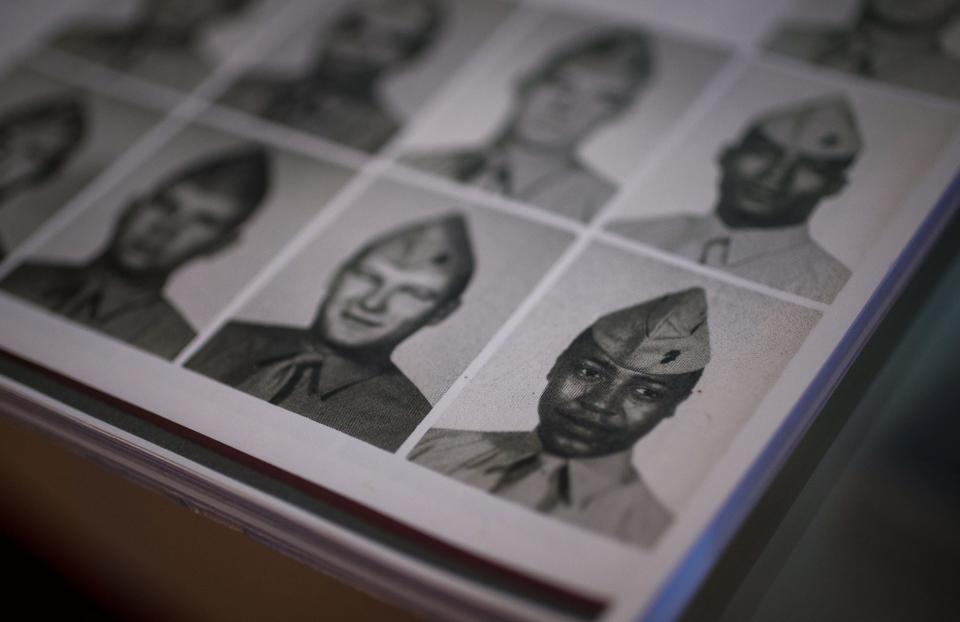 A 17-year-old Fred Norris is pictured inside a Vietnam War memorial book that sits on his coffee table Tuesday, Jan. 25, 2022, inside his Indianapolis home. Norris is now 76 and tries to not think back on those days. The book chronicles Norris' U.S. Marines 2nd Battalion, 1st Marines. He served as a mortarman in the 81mm mortar unit after the 2/1 traded unit designations with the 3rd Battalion, 3rd Marines. 