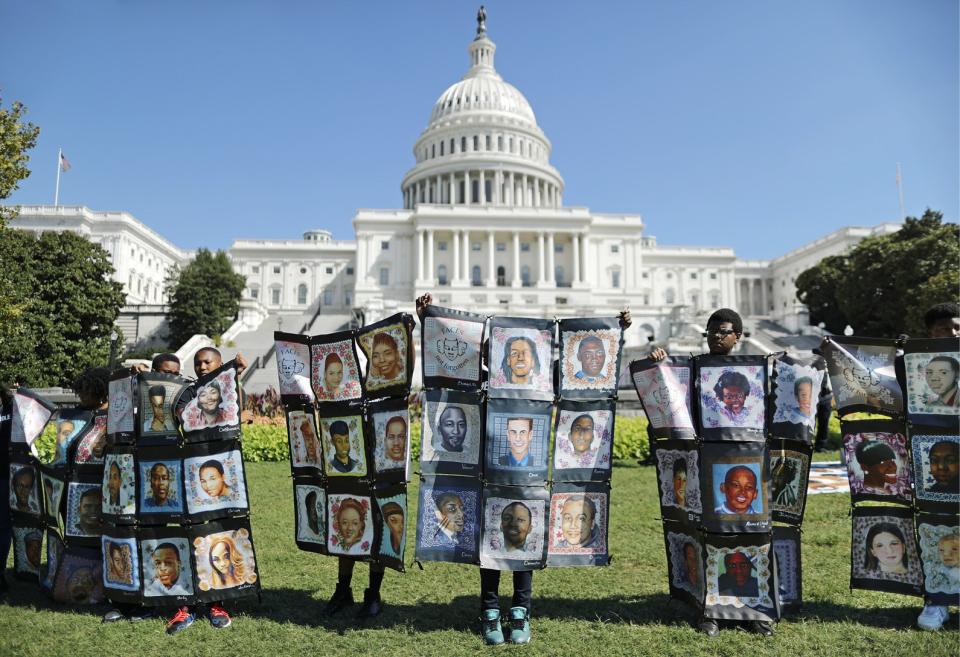 In September, students displayed images of victims at a gun-violence rally in Washington, D.C.