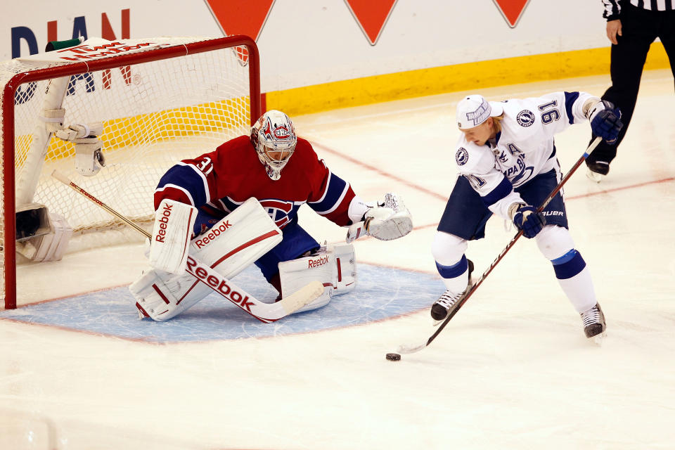 OTTAWA, ON - JANUARY 28: Steven Stamkos #91 of the Tampa Bay Lightning and Team Alfredsson takes a shot against Carey Price #31 of the Montreal Canadiens and Team Chara during Tim Hortons NHL Elimination Shoot Out of the 2012 Molson Canadian NHL All-Star Skills Competition at Scotiabank Place on January 28, 2012 in Ottawa, Ontario, Canada. (Photo by Gregory Shamus/Getty Images)