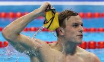 2016 Rio Olympics - Swimming - Final - Men's 100m Freestyle Final - Olympic Aquatics Stadium - Rio de Janeiro, Brazil - 10/08/2016. Kyle Chalmers (AUS) of Australia reacts after winning the gold medal. REUTERS/Stefan Wermuth