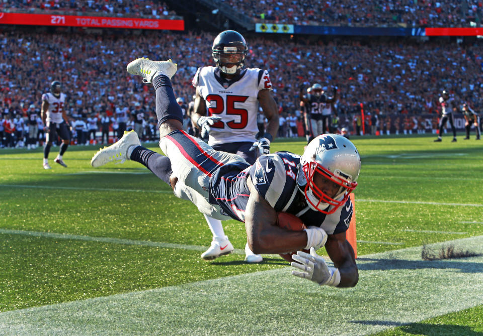 <p>New England Patriots wide receiver Brandin Cooks sails across the goal line as he stayed in bounds to make the game-winning touchdown late in the fourth quarter on a pass from quarterback Tom Brady during a game against the Houston Texans at Gillette Stadium in Foxborough, Mass., Sept. 24, 2017. (Photo by Jim Davis/The Boston Globe via Getty Images) </p>