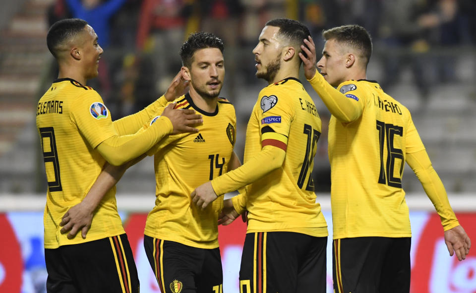 Belgium's Eden Hazard, 2nd right, celebrates with teammates after scoring his sides second goal during the Euro 2020 Group I qualifying match between Belgium and Russia at the King Baudouin stadium in Brussels on Thursday March 21, 2019. (AP Photo/Geert Vanden Wijngaert)