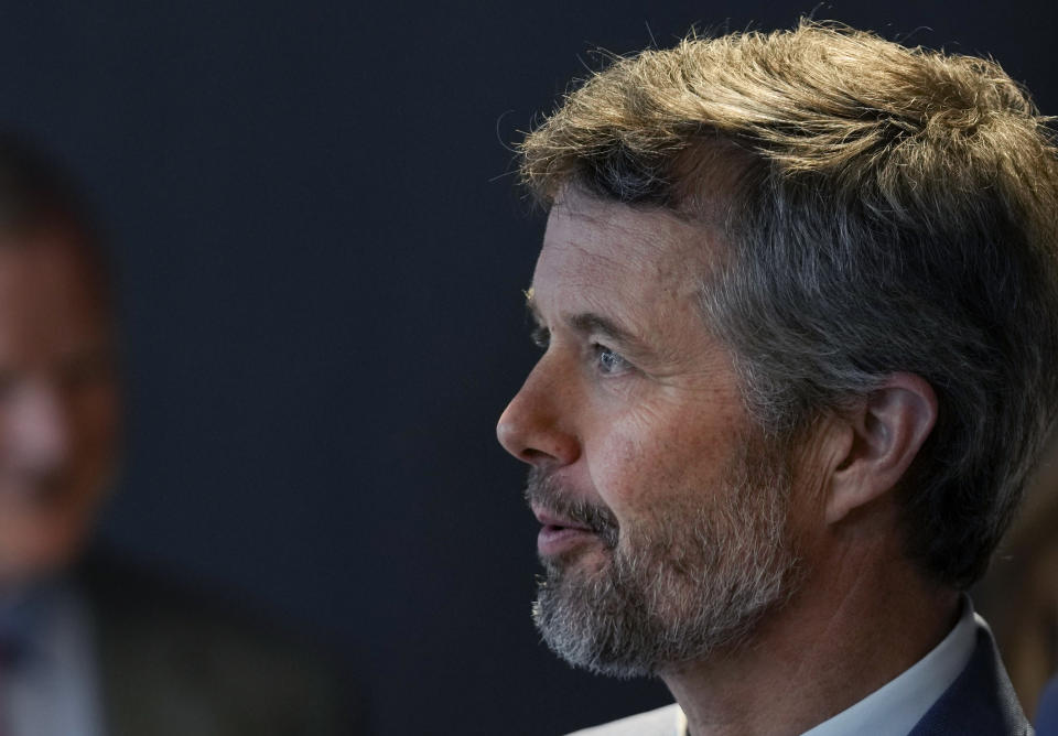 FILE - Crown Prince Frederik of Denmark meets business leaders at a conference in The Hague, Netherlands, Monday, June 20, 2022. As a teenager, Crown Prince Frederik felt uncomfortable being in the spotlight, and pondered whether there was any way he could avoid becoming king. All doubts have been swept aside as the 55-year-old takes over the crown on Sunday, Jan. 14, 2024 from his mother, Queen Margrethe II, who is breaking with centuries of Danish royal tradition and retiring after a 52-year reign. (AP Photo/Peter Dejong, File)