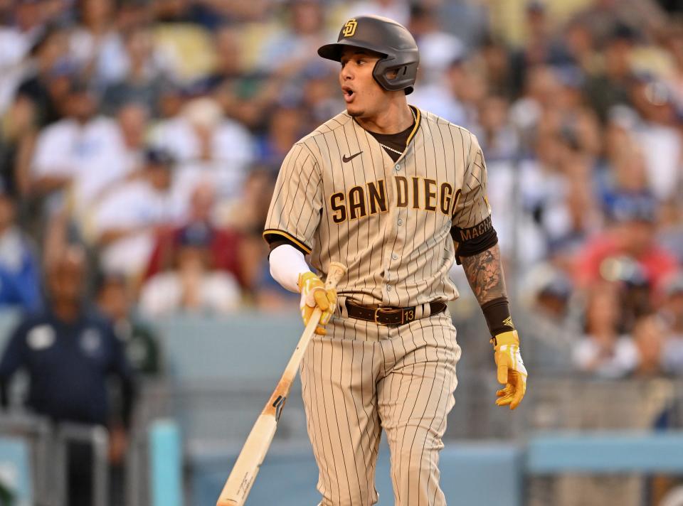 San Diego Padres third baseman Manny Machado reacts after he was called out on a strike in the first inning against the Los Angeles Dodgers on Aug. 5 at Dodger Stadium.