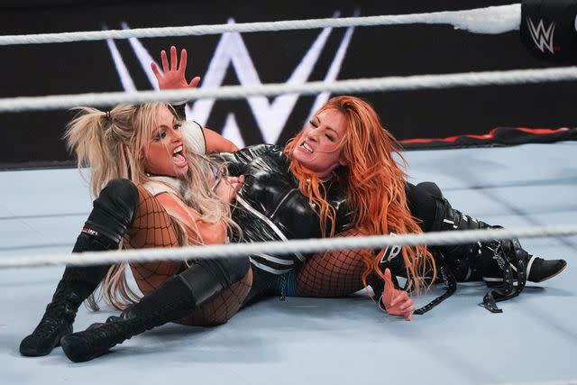 <p>Alex Bierens de Haan/Getty</p> WWE stars Liv Morgan and Becky Lynch