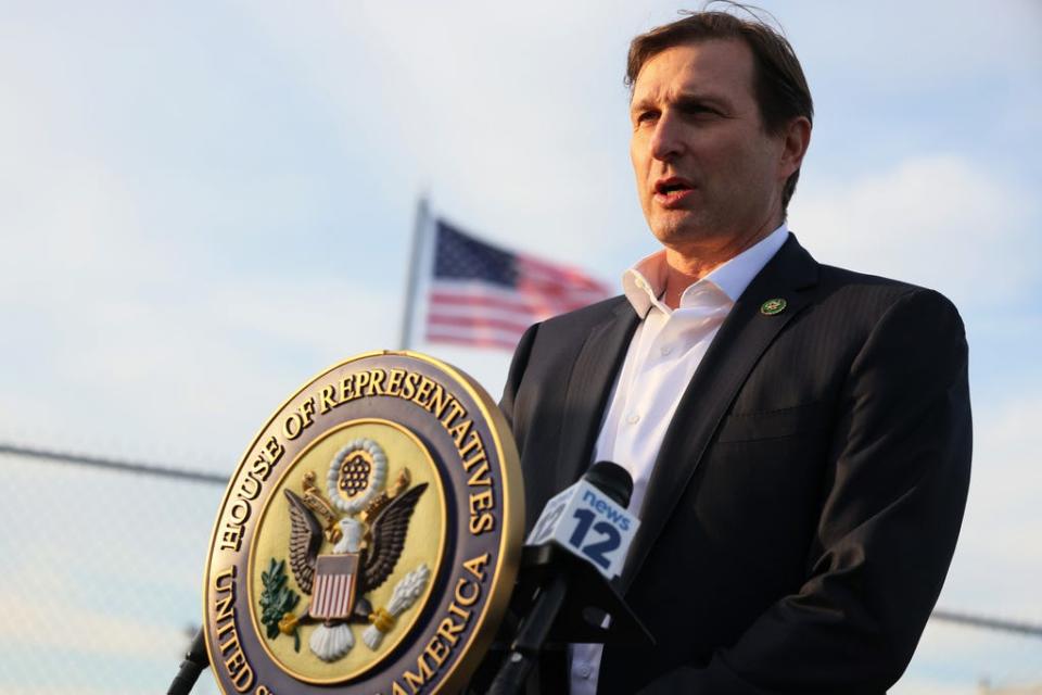 Rep. Dan Goldman, D-N.Y., speaks during a press conference at the entrance of the migrant relief center at Brooklyn Cruise Terminal on February 02, 2023 in New York City.