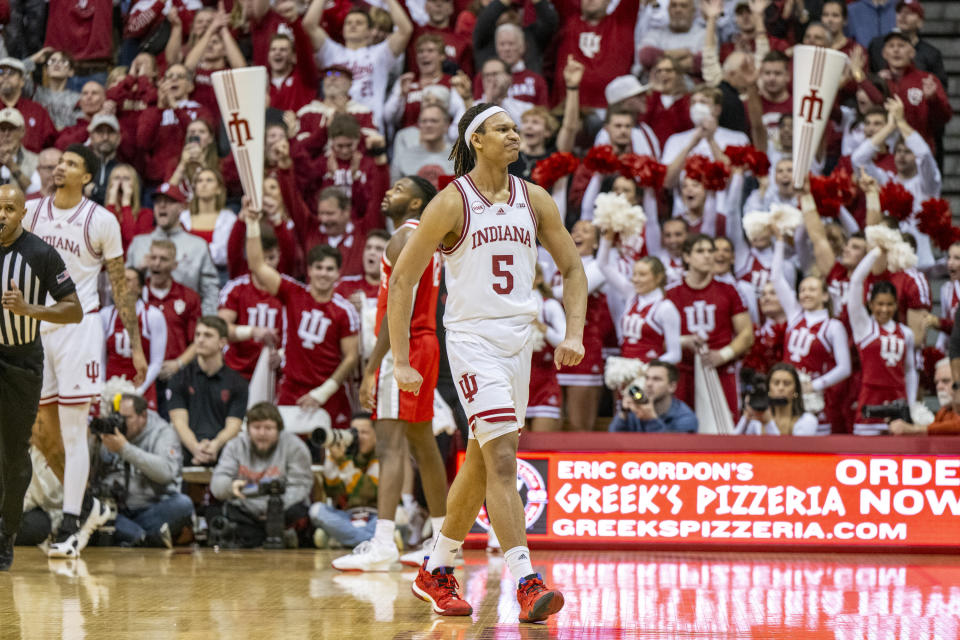 Indiana forward Malik Reneau (5) flexes as he leaves the court after the team's win over Ohio State in an NCAA college basketball game Saturday, Jan. 6, 2024, in Bloomington, Ind. (AP Photo/Doug McSchooler)