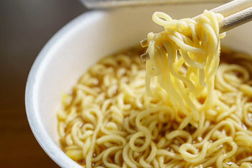 A styrofoam cup of instant noodles