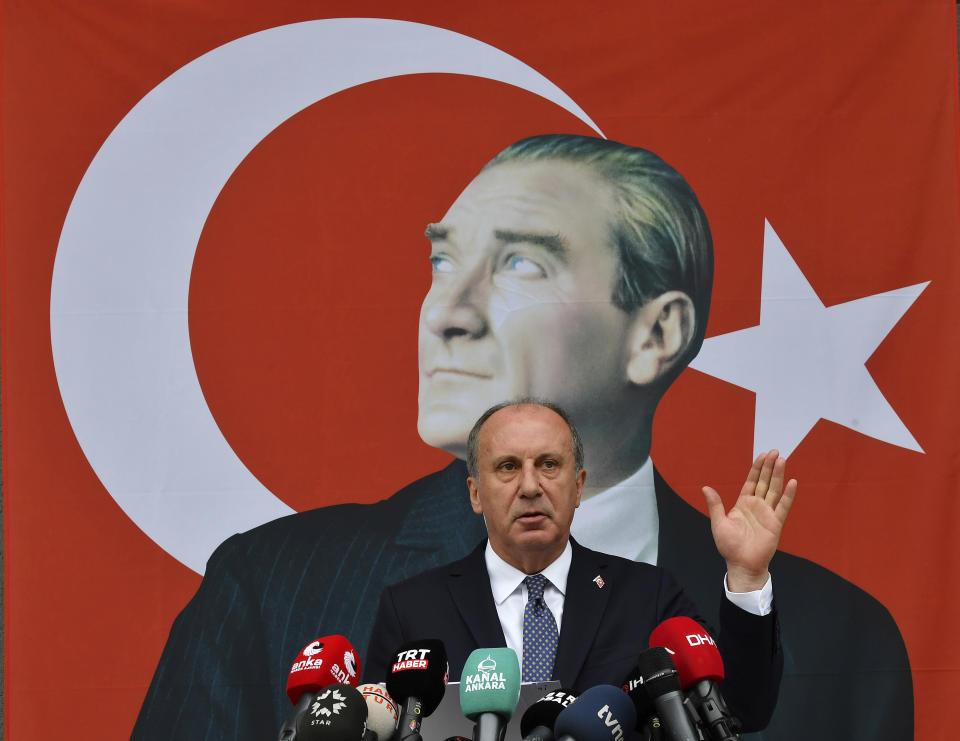 FILE - Muharrem Ince gestures as he announces his resignation from Turkey's main opposition party, CHP, during a media conference next to a poster of modern Turkey's founder, Mustafa Kemal Ataturk, in Ankara, Turkey, Monday, Feb. 8, 2021. Muharrem Ince, the leader of the center-left Homeland Party, a candidate in Sunday's elections announced Thursday, May 11, 2023 that he is withdrawing from the presidential race, in a move that is likely to bolster President Recep Tayyip Erdogan's main challenger. (AP Photo/File)