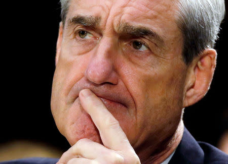 FILE PHOTO: Robert Mueller, as FBI director, pauses after making an opening statement at a U.S. Senate Judiciary Committee oversight hearing about the Federal Bureau of Investigation on Capitol Hill in Washington, June 19, 2013. REUTERS/Larry Downing/File Photo