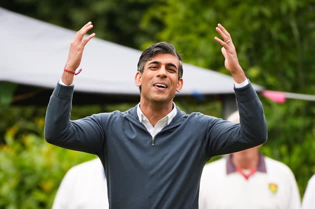 Rishi Sunak reacts while playing a game of bowls during a visit to Market Bosworth Bowling Club while on the general election campaign trail. 