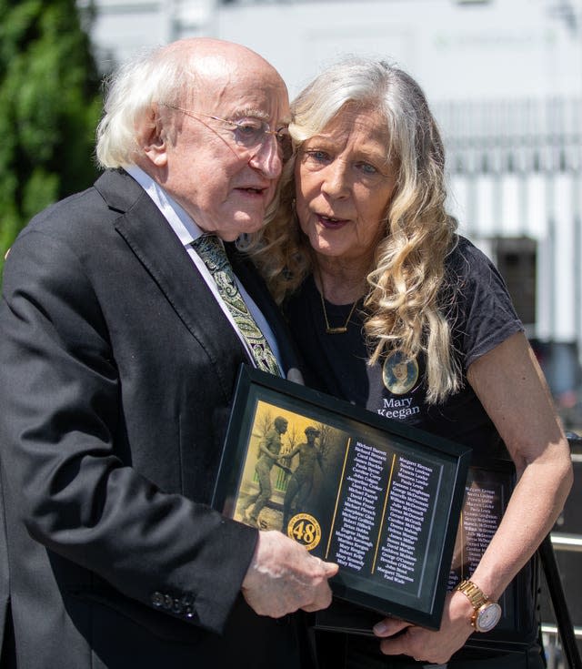 President of Ireland Michael D Higgins with Stardust survivor and campaigner Antoinette Keegan after a Stardust ceremony of commemoration at the Garden of Remembrance in Dublin