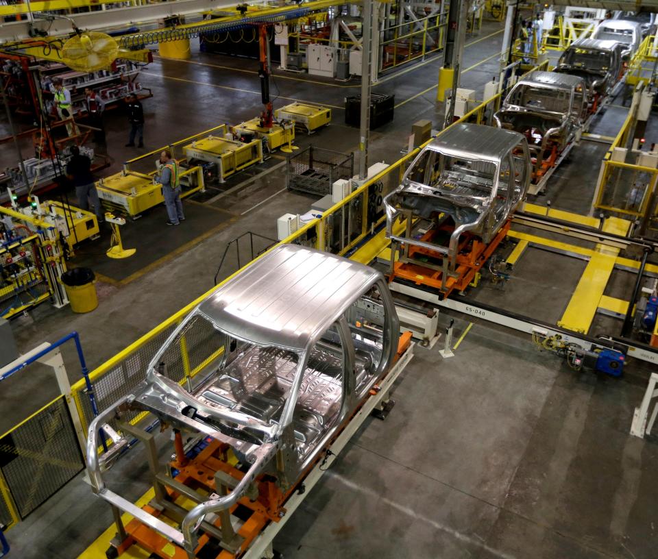 Cabs for the new aluminum-alloy body Ford F-150 truck move through the body shop at the company's Kansas City Assembly Plant in March 2015 in Claycomo, Mo.