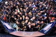 Alibaba Group Holding Ltd founder Jack Ma joined by Alibaba executives and NYSE CEO Tom Farley gather around the post during their IPO at the New York Stock Exchange in New York September 19, 2014. REUTERS/Ben Hider/NYSE/Handout