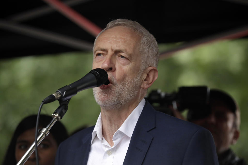 FILE - In this Tuesday, June 4, 2019 file photo, the leader of Britain's opposition Labour party Jeremy Corbyn makes a speech on stage during a rally on Whitehall in London. Britain’s fractious opposition politicians are giving a mixed reception to a plan by Labour Party leader Jeremy Corbyn to block a no-deal Brexit. Prime Minister Boris Johnson has vowed that Britain will leave the EU on Oct. 31, with or without a divorce deal. (AP Photo/Matt Dunham, File)