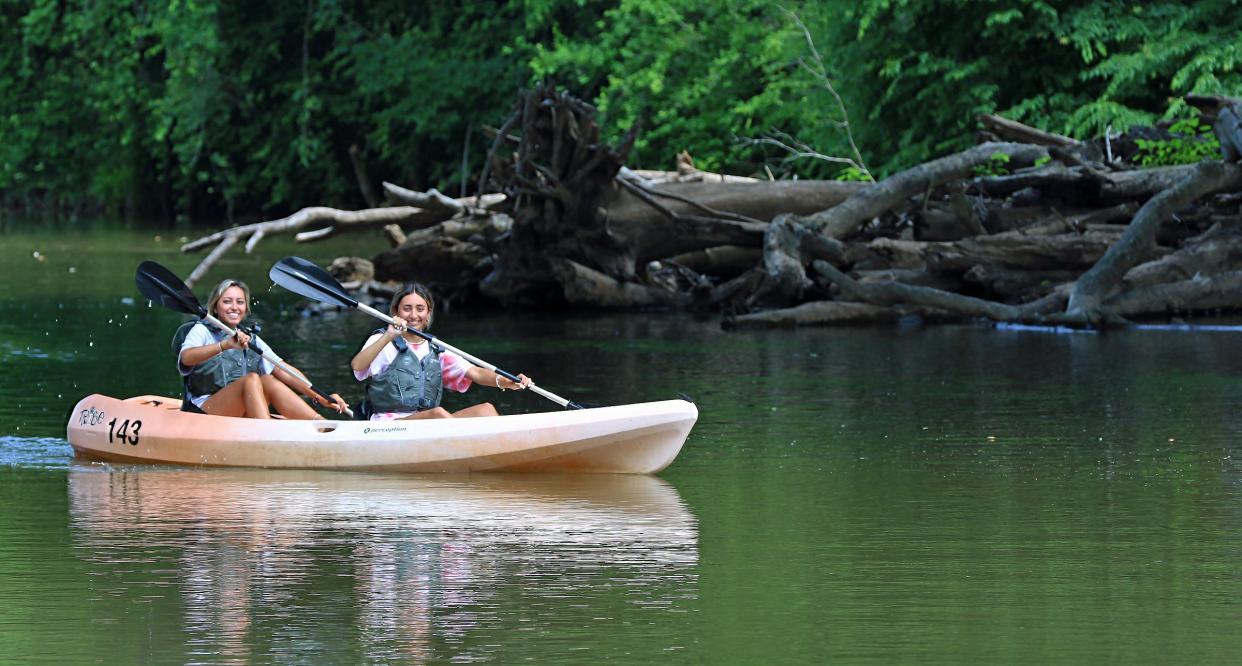 Sisters Katie and Ashley Mull rent a kayak together at the Catawba Riverkeeper Foundation's "The Boathouse"  Saturday afternoon, June 5, 2021 on Willow Drive in McAdenville.