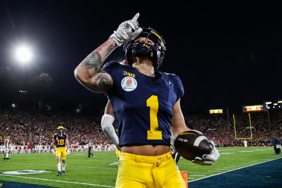 Michigan wide receiver Roman Wilson (1) celebrates a touchdown against Alabama during the second half of the Rose Bowl in Pasadena, Calif., on Monday, Jan. 1, 2024.