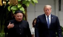 FILE PHOTO: FILE PHOTO: North Korea's leader Kim Jong Un and U.S. President Donald Trump talk in the garden of the Metropole hotel during the second North Korea-U.S. summit in Hanoi