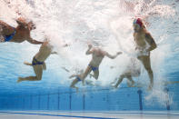 <p>Gianmarco Nicosia (R) of Team Italy in action during the Men’s Classification 7th-8th match between Montenegro and Italy on day sixteen of the Tokyo 2020 Olympic Games at Tatsumi Water Polo Centre on August 08, 2021 in Tokyo, Japan. (Photo by Maddie Meyer/Getty Images)</p> 