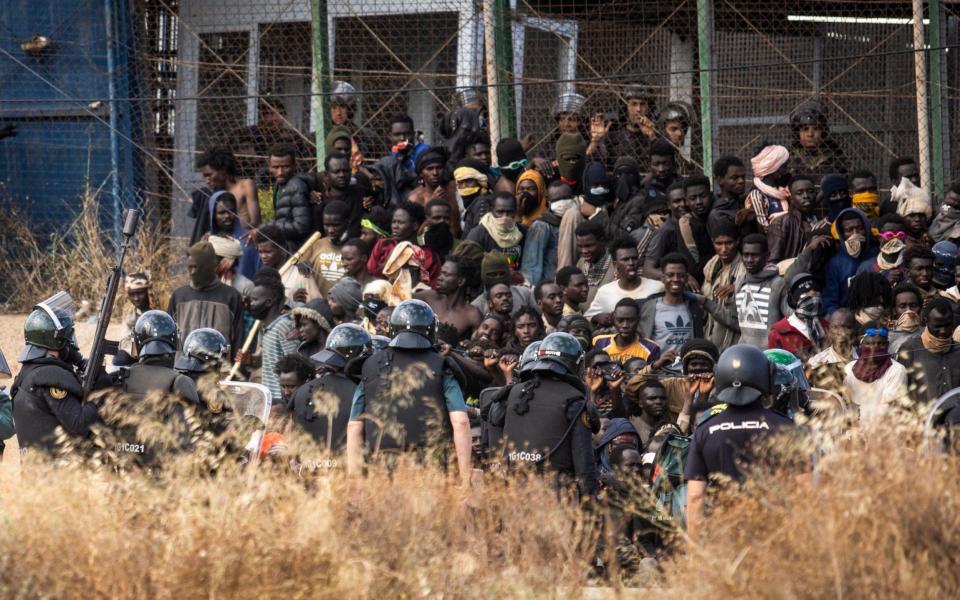 Dozens of migrants manage to cross the fence onto Spanish territory in Melilla - Javier Bernardo/AP