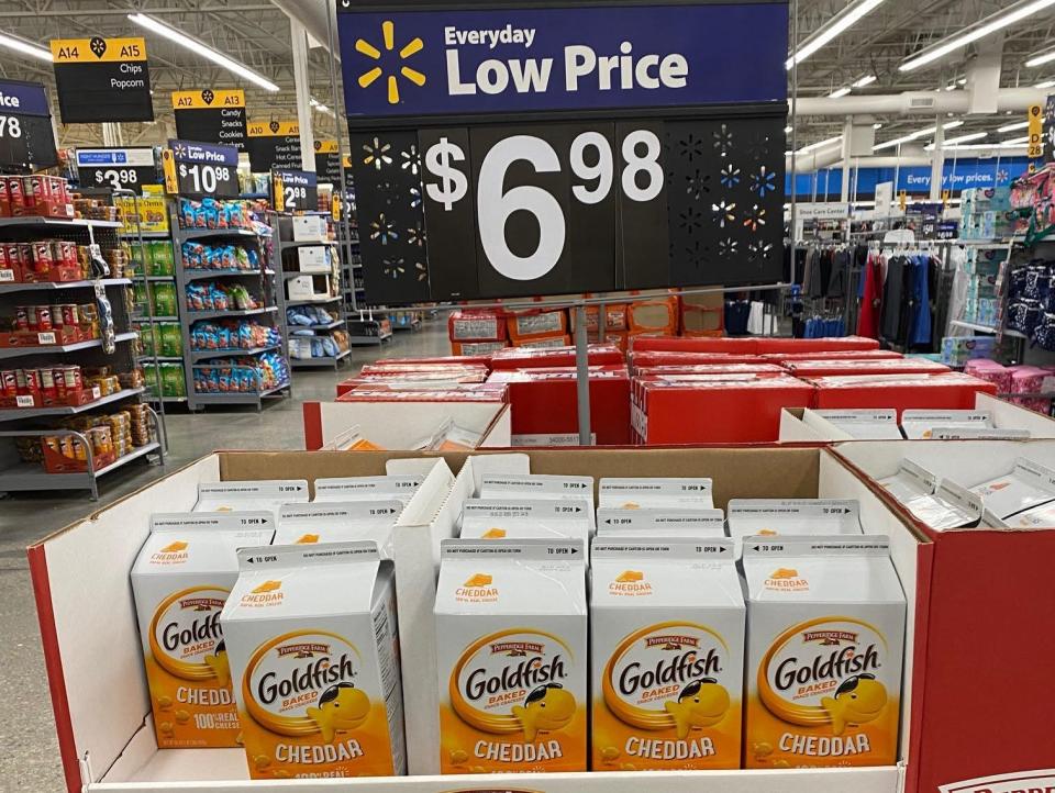 cartons of goldfish in the aisles at walmart