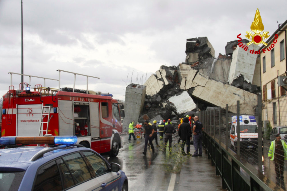 <em>Emergency services survey the damage of the collapse (Reuters)</em>