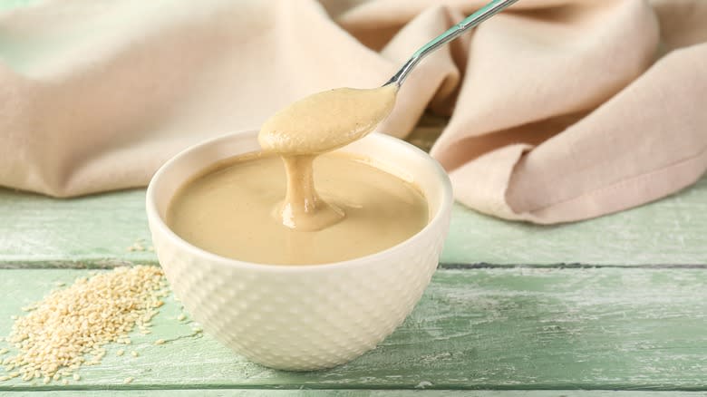 spoon in bowl of tahini