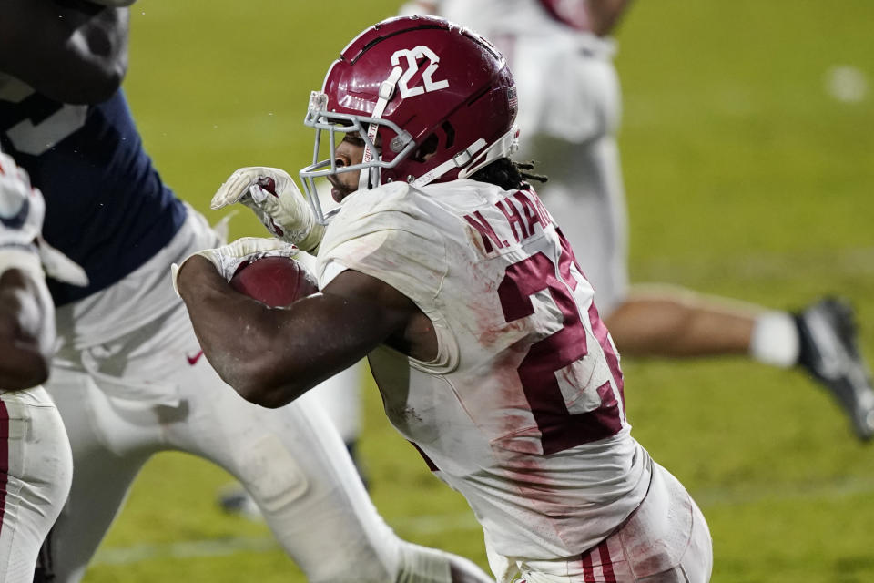 Alabama running back Najee Harris runs for a first down against Mississippi during the second half of an NCAA college football game in Oxford, Miss., Saturday, Oct. 10, 2020. Alabama won 63-48. (AP Photo/Rogelio V. Solis)