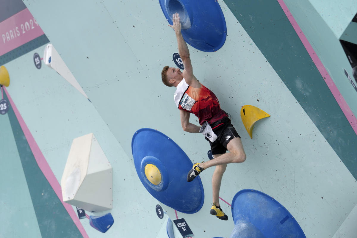 Sport climbers celebrate decision to split competitions at the Paris Olympics and award an additional medal