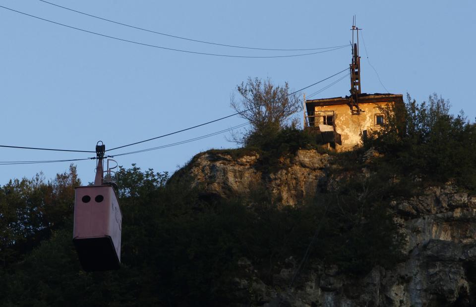 A cable car passes above the town of Chiatura