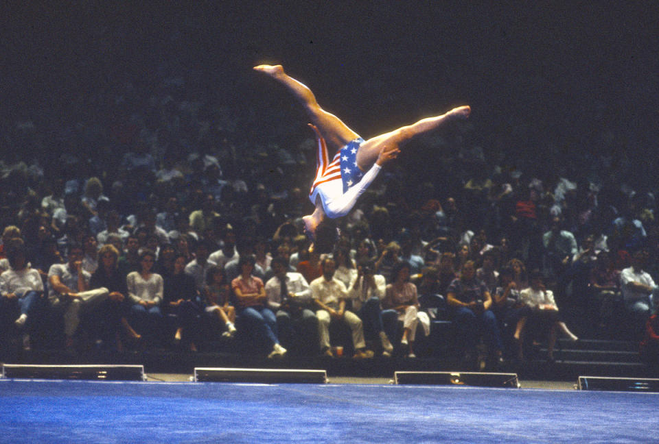 Mary Lou Retton flips through the air at the 1984 Olympics