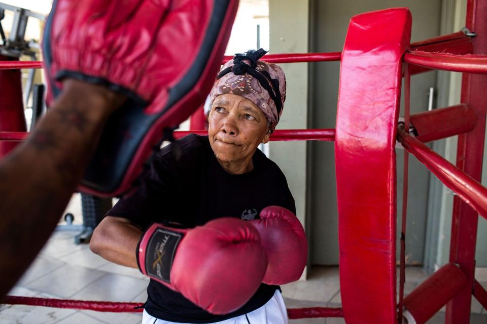 <p>Gladys Ngwenya, 77, spars during a "Boxing Gogos" (grannies) training session hosted by the A Team Gym in Cosmo City, Johannesburg in September 2017. </p><p><strong>RELATED: </strong><a href="https://www.redbookmag.com/life/news/g4351/national-geographic-2017-photo-contest-nature/" rel="nofollow noopener" target="_blank" data-ylk="slk:10 of the Most Stunning Travel Photos You'll See All Year;elm:context_link;itc:0;sec:content-canvas" class="link "><strong>10 of the Most Stunning Travel Photos You'll See All Year</strong></a></p>