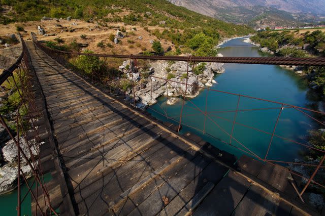 Goran Safarek / Getty Images A hanging bridge over the Vjosa River, Albania