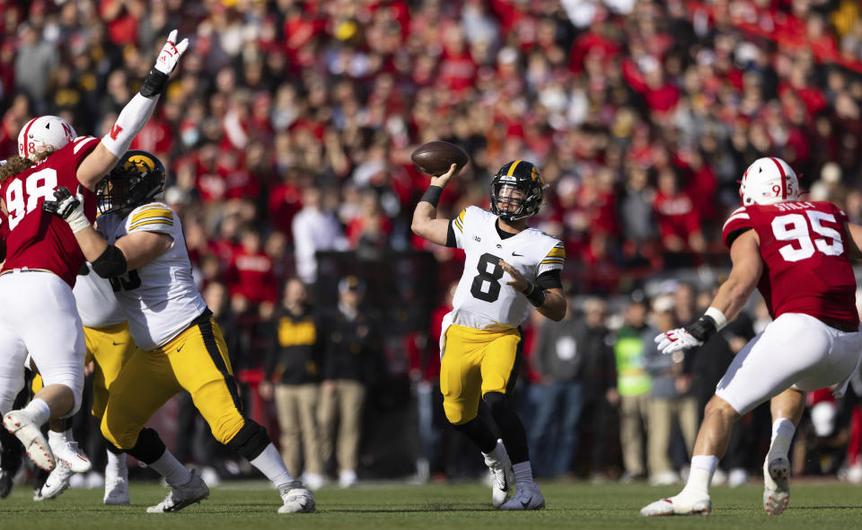 Iowa quarterback Alex Padilla (8) throws a pass during the first half of an NCAA college football game against Nebraska, Friday, Nov. 26, 2021, at Memorial Stadium in Lincoln, Neb. (AP Photo/Rebecca S. Gratz)