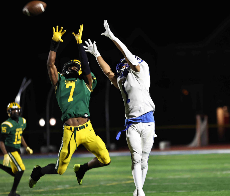 Taft's Tayshawn Banks (7) breaks up a pass intended for Wyoming's D.J Gray (1) during their playoff game Friday, Nov. 3, 2023.