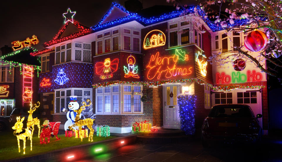 Putting up Christmas lights can even help you bond with your neighbours [Photo: Getty]