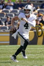 Las Vegas Raiders quarterback Derek Carr (4) looks to pass during the second half of an NFL football game against the Pittsburgh Steelers in Pittsburgh, Sunday, Sept. 19, 2021. (AP Photo/Keith Srakocic)