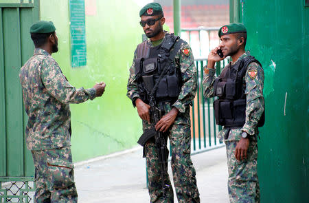 Maldivian military members stand guard near the premises of Maldivian president-elect Ibrahim Mohamed Solih's swearing-in ceremony, which is to be held in Male, Maldives November 16, 2018. REUTERS/Ashwa Faheem