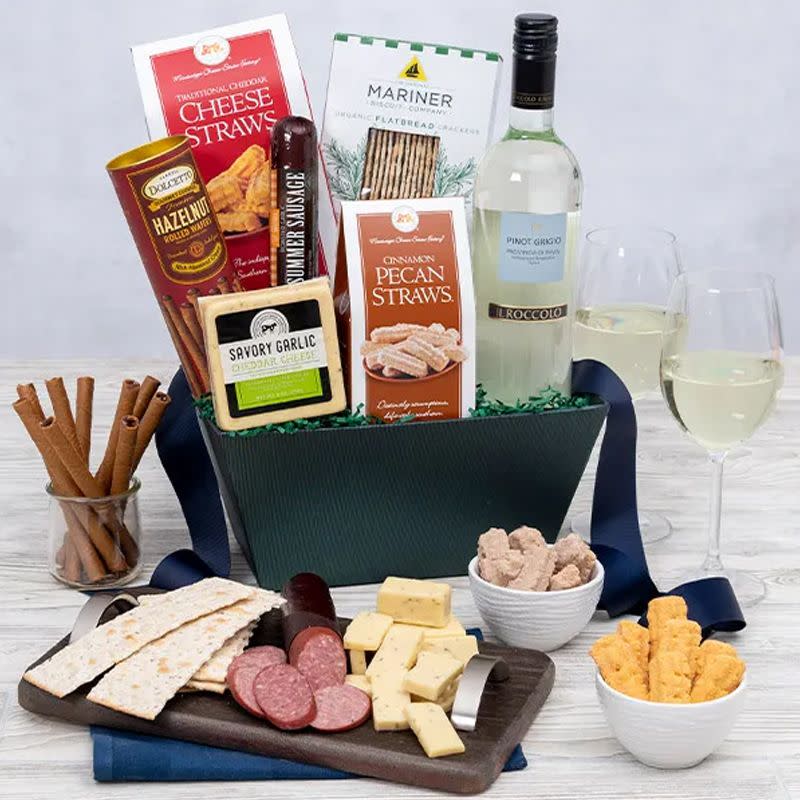 <p><a href="https://go.redirectingat.com?id=74968X1596630&url=https%3A%2F%2Fwww.gourmetgiftbaskets.com%2FClassic-White-Wine-Gift-Basket.asp&sref=https%3A%2F%2Fwww.esquire.com%2Ffood-drink%2Fg38036473%2Fbest-wine-gift-baskets%2F" rel="nofollow noopener" target="_blank" data-ylk="slk:Shop Now;elm:context_link;itc:0;sec:content-canvas" class="link rapid-noclick-resp">Shop Now</a></p><p>Classic White Wine Gift Basket</p><p>$84.99</p><p>gourmetgiftbaskets.com</p>