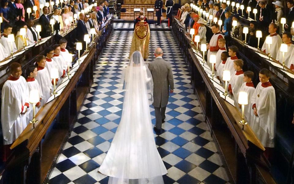 The Prince of Wales walking Meghan Markle down the aisle