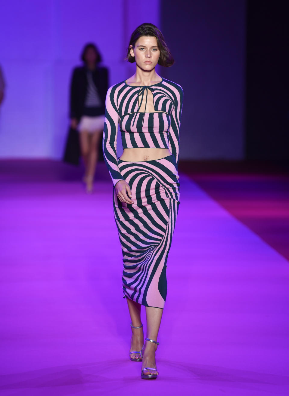 A model walks the runway at the Brandon Maxwell spring/summer 2022 fashion show in the Brooklyn borough of New York during Fashion Week on Friday, Sept. 10, 2021. (Photo by Evan Agostini/Invision/AP)