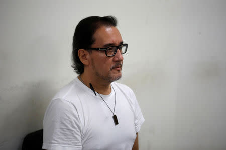 El Salvador's former attorney general Luis Martinez waits for a hearing, under charges of disclosure of reserved material of a case, in San Salvador, El Salvador October 16, 2018. REUTERS/Jose Cabezas/Files