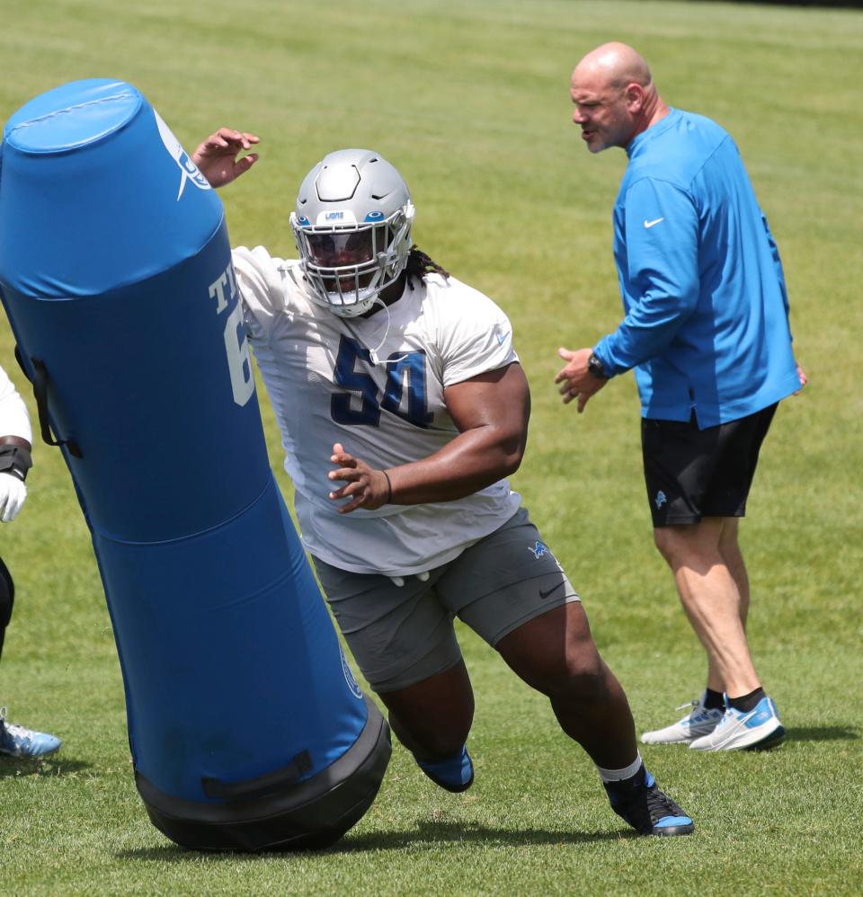 Lions nose tackle Alim McNeill goes through drills during OTAs on Thursday, June 2, 2022, in Allen Park.